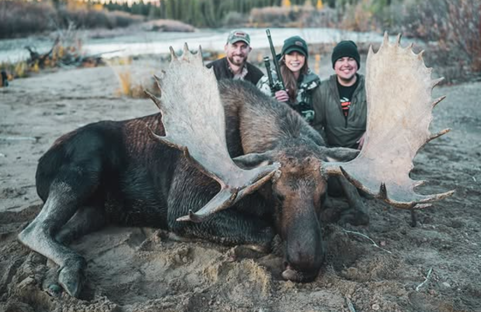 Noem proudly killing another animal and collecting a trophy.